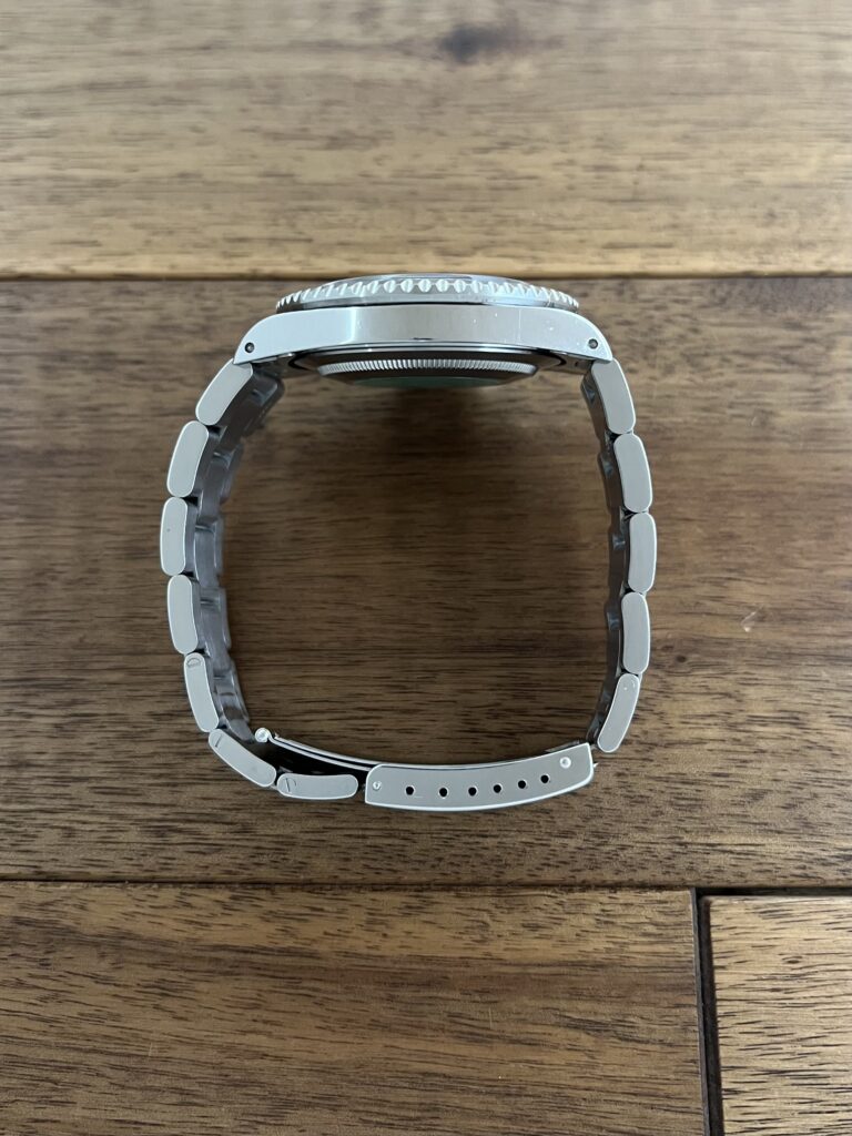 ロレックス GMTマスター 16710 ブラック(黒) 赤黒ベゼル W7番台 シングルバックル トリチウム 中古 ケースサイド側から 委託 高価 買取 販売 名古屋