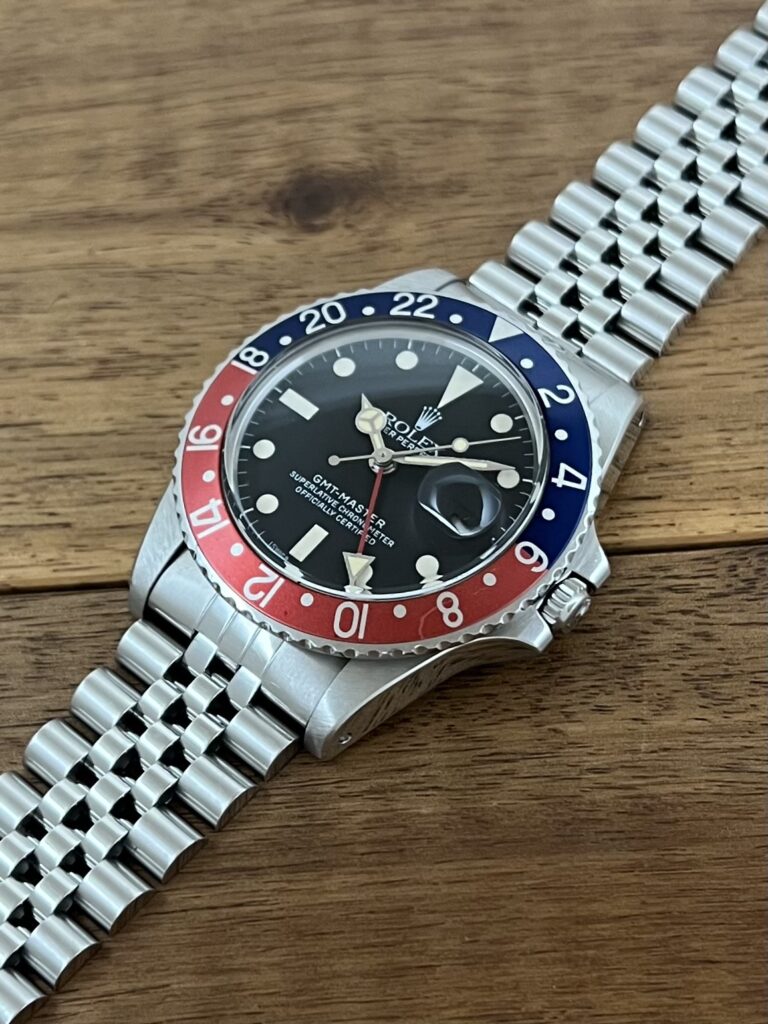 ロレックス GMTマスター 16750 ブラック(黒) 赤青ベゼル 76番台 フチなし シングルバックル トリチウム 中古 5時側から 中古 ロレックス GMTマスター 16750 ブラック(黒) 赤青ベゼル 76番台 フチなし シングルバックル トリチウム フチなし 委託 高価 買取 販売 名古屋