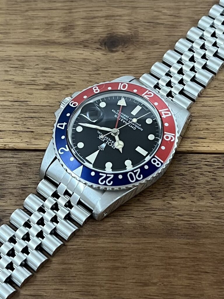 ロレックス GMTマスター 16750 ブラック(黒) 赤青ベゼル 76番台 フチなし シングルバックル トリチウム 中古 11時側から 中古 ロレックス GMTマスター 16750 ブラック(黒) 赤青ベゼル 76番台 フチなし シングルバックル トリチウム フチなし 委託 高価 買取 販売 名古屋