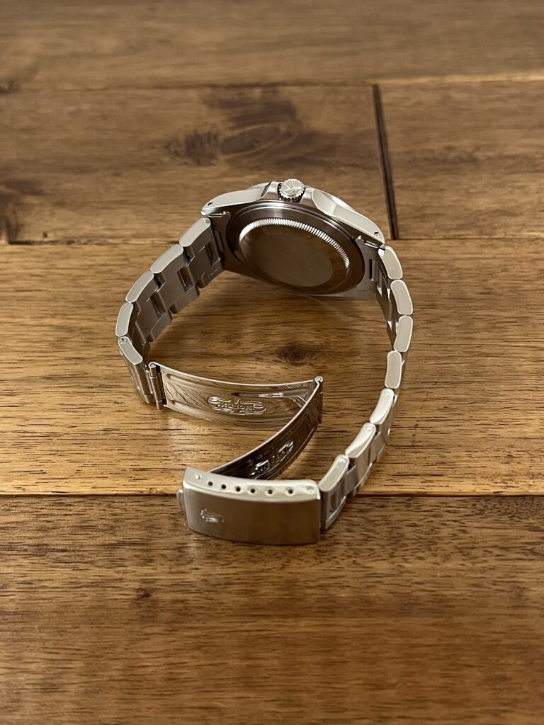 ロレックス エクスプローラー2 16570 N1番 ホワイトダイアル トリチウム パティーナ 中古 クラスプ側から全体の画像 委託 高価 買取 販売 名古屋
