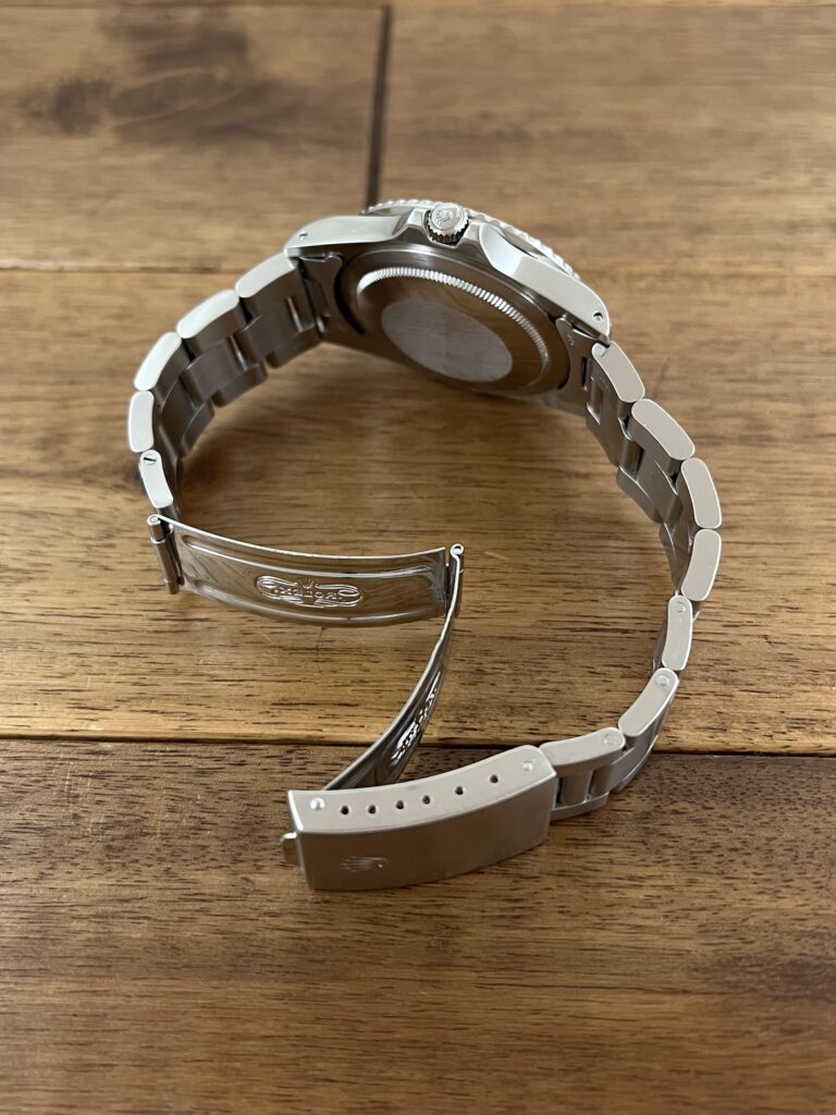 ロレックス GMTマスター 16750 72番台 ブラックダイアル 赤青ベゼル フチなし トリチウム セミヴィンテージ 中古 クラスプ側から全体の画像 委託 高価 買取 販売 名古屋