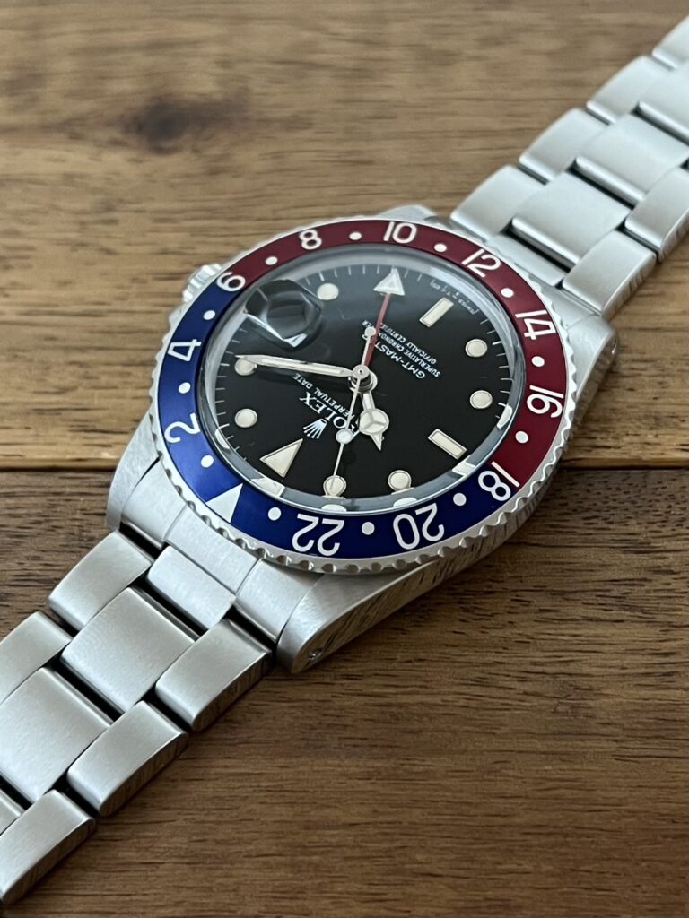 ロレックス GMTマスター 16750 95番台 ブラックダイアル 赤青ベゼル フチあり シングルバックル トリチウム 中古 セミヴィンテージ 11時側からの画像 委託 高価 買取 販売 名古屋