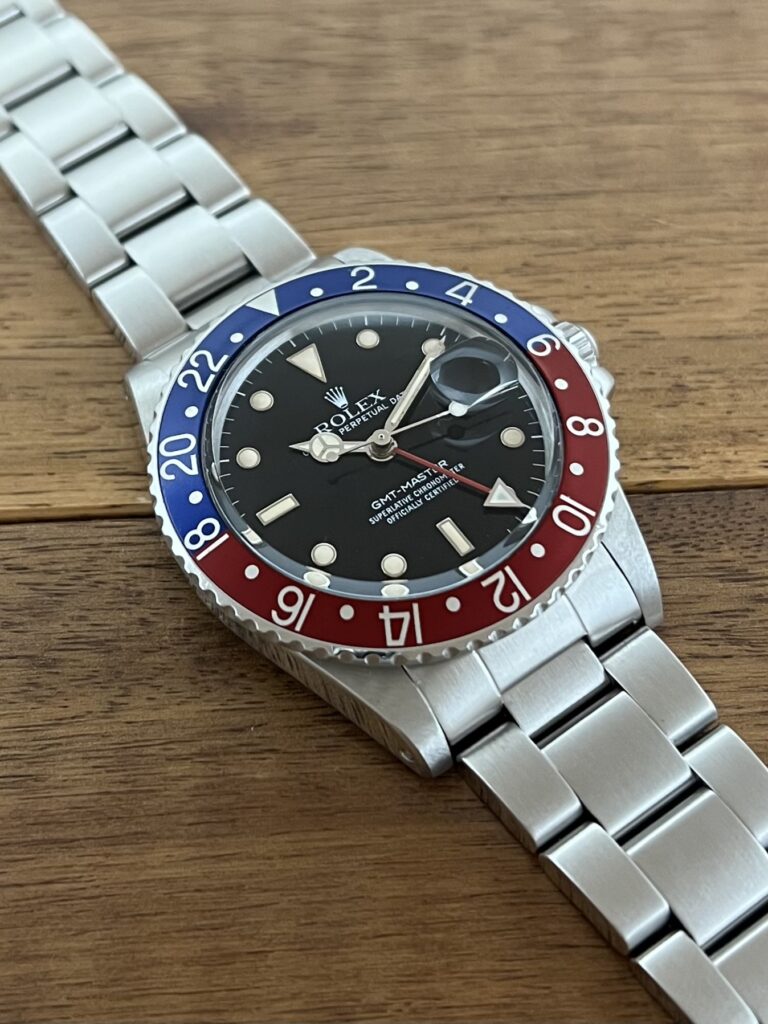 ロレックス GMTマスター 16750 95番台 ブラックダイアル 赤青ベゼル フチあり シングルバックル トリチウム 中古 セミヴィンテージ 7時側からの画像 委託 高価 買取 販売 名古屋