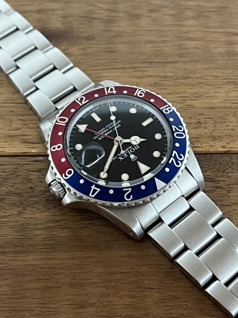 ロレックス GMTマスター 16750 95番台 ブラックダイアル 赤青ベゼル フチあり シングルバックル トリチウム 中古 セミヴィンテージ 1時側からの画像 委託 高価 買取 販売 名古屋